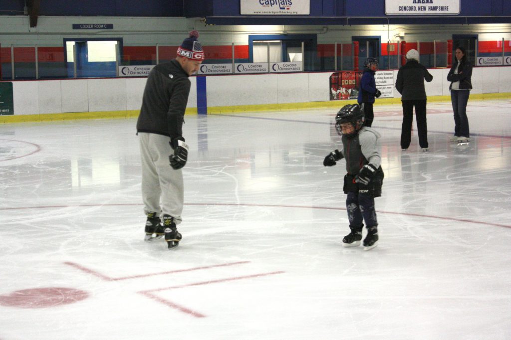 Carter Locke (right), 5, gets an ice skating lesson from his dad, Nate, at Everett Arena last week. There were a few slips and falls along the way, but that didn't stop these boys from having an ice time (see what we did there?). JON BODELL / Insider staff