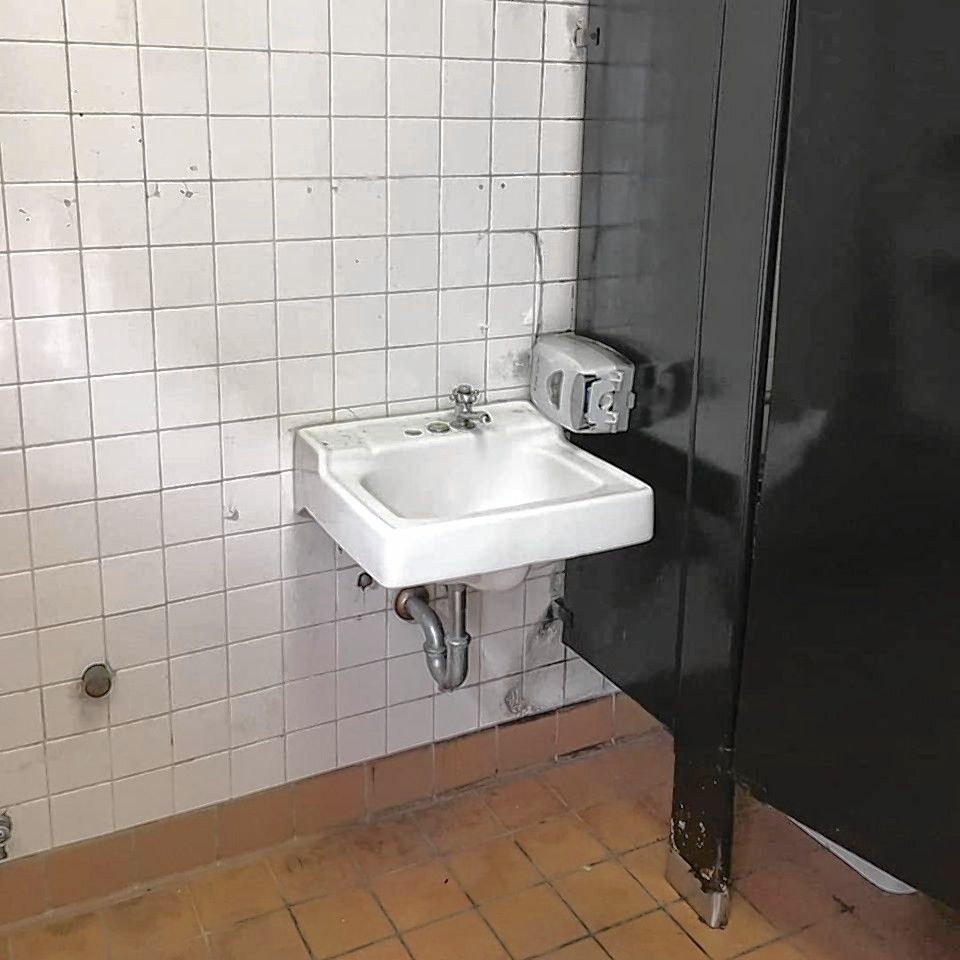 A sink in one of the public bathrooms in Bicentennial Square in Concord is shown before renovation. 