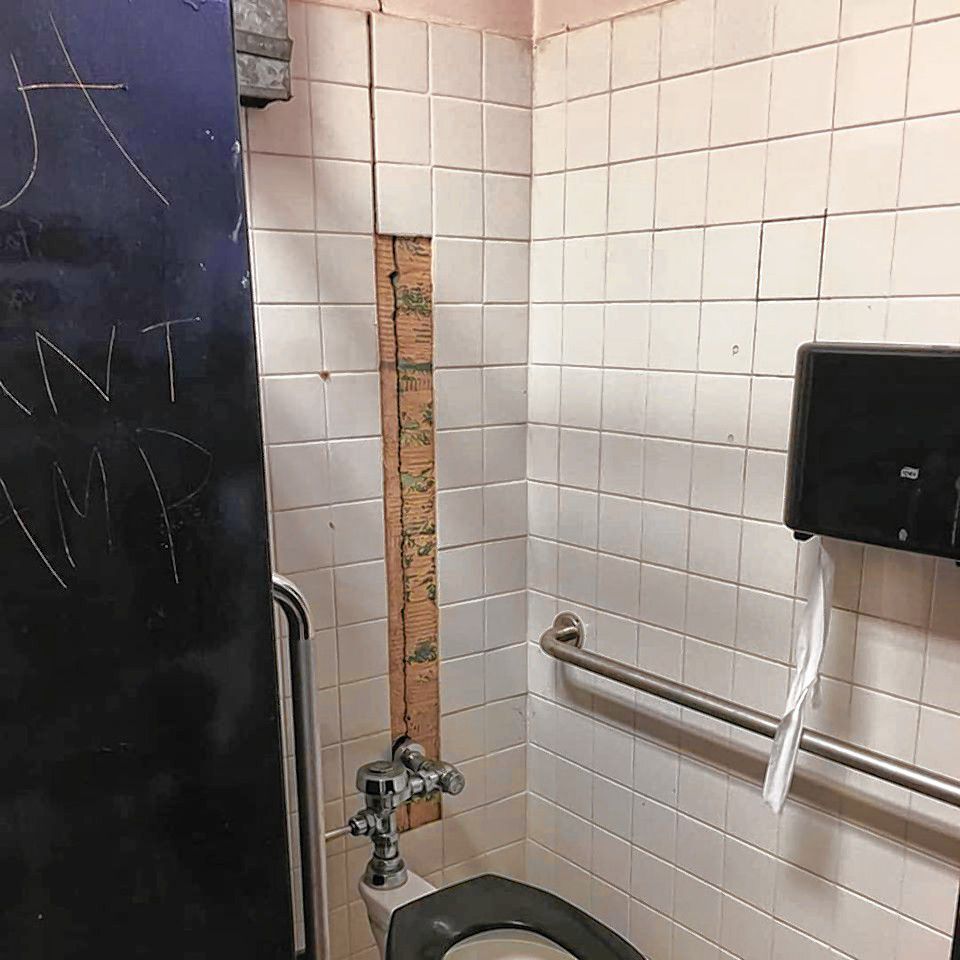 A stall in one of the public bathrooms in Bicentennial Square in Concord is shown before renovations. 