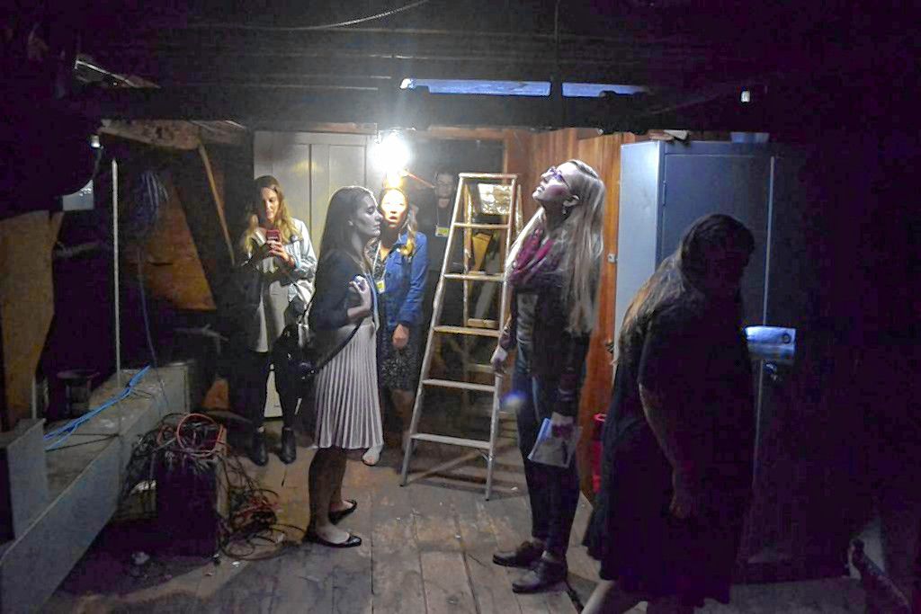 Visitors check out the attic at Parker Academy on Oct. 4, 2018, during the Upstairs Downtown tour. The building was the home of Lewis Downing Jr. and staff of the school say the attic light turns on without cause. Sarah Pearson 