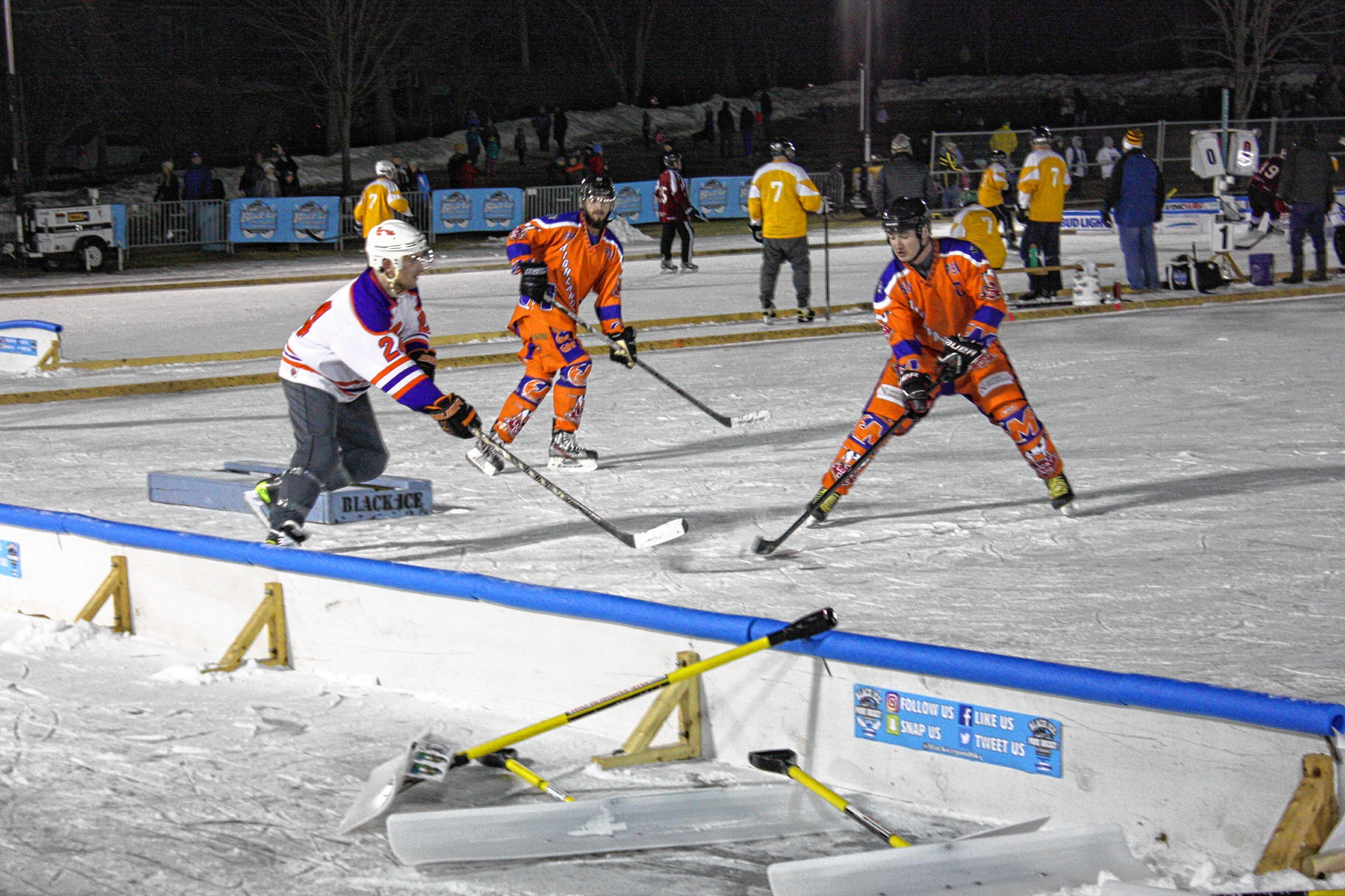 Hundreds of spectators braved the cold Saturday night to check out the action at the 1883 Black Ice Pond Hockey Championship at White Park on Jan. 25, 2019.  