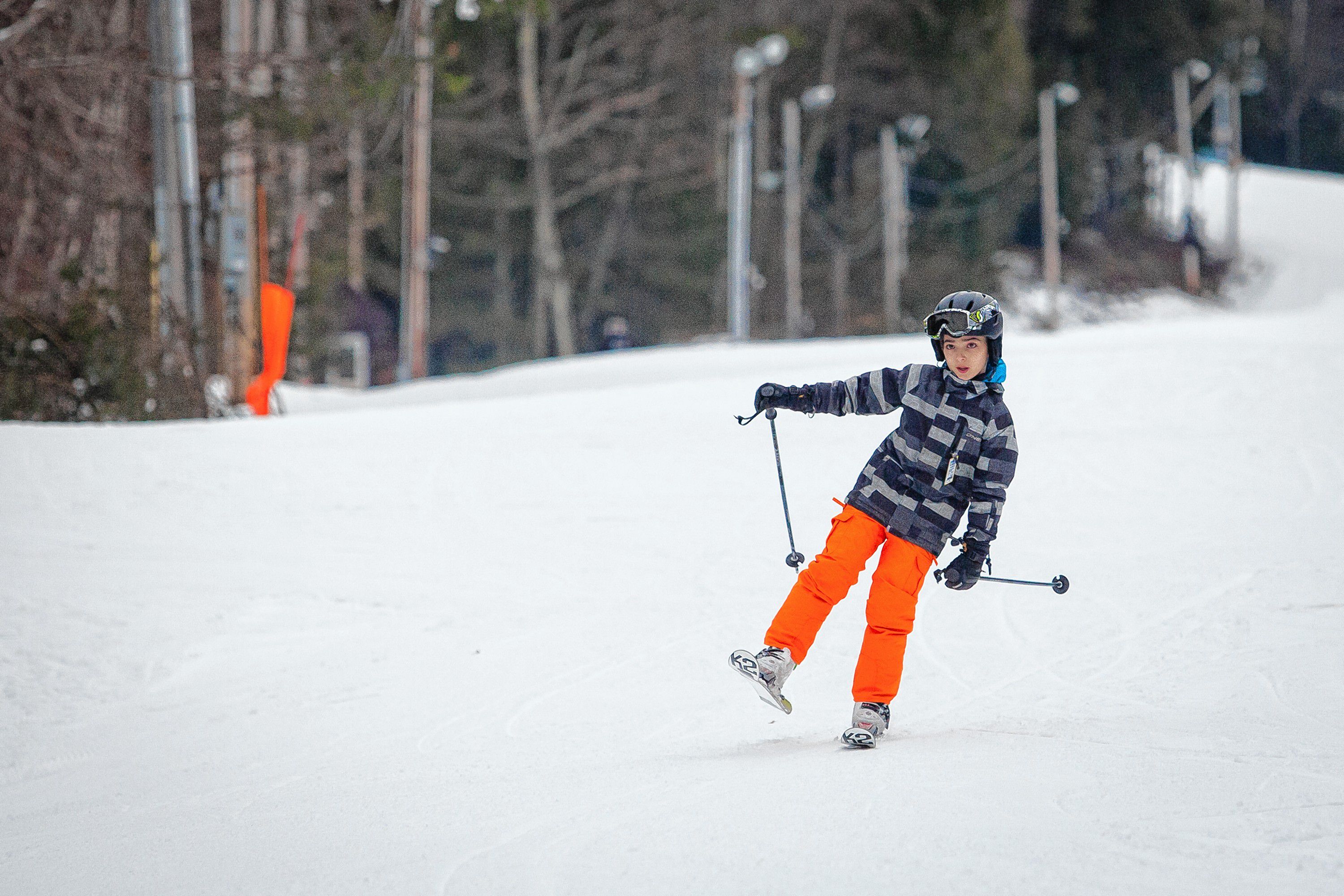 Nelphison Dealmeida, 11, of Hampstead, ends a ski run with one foot in the air at Pats Peak in Henniker on Tuesday afternoon, Jan. 17, 2017. (ELIZABETH FRANTZ / Monitor staff) ELIZABETH FRANTZ