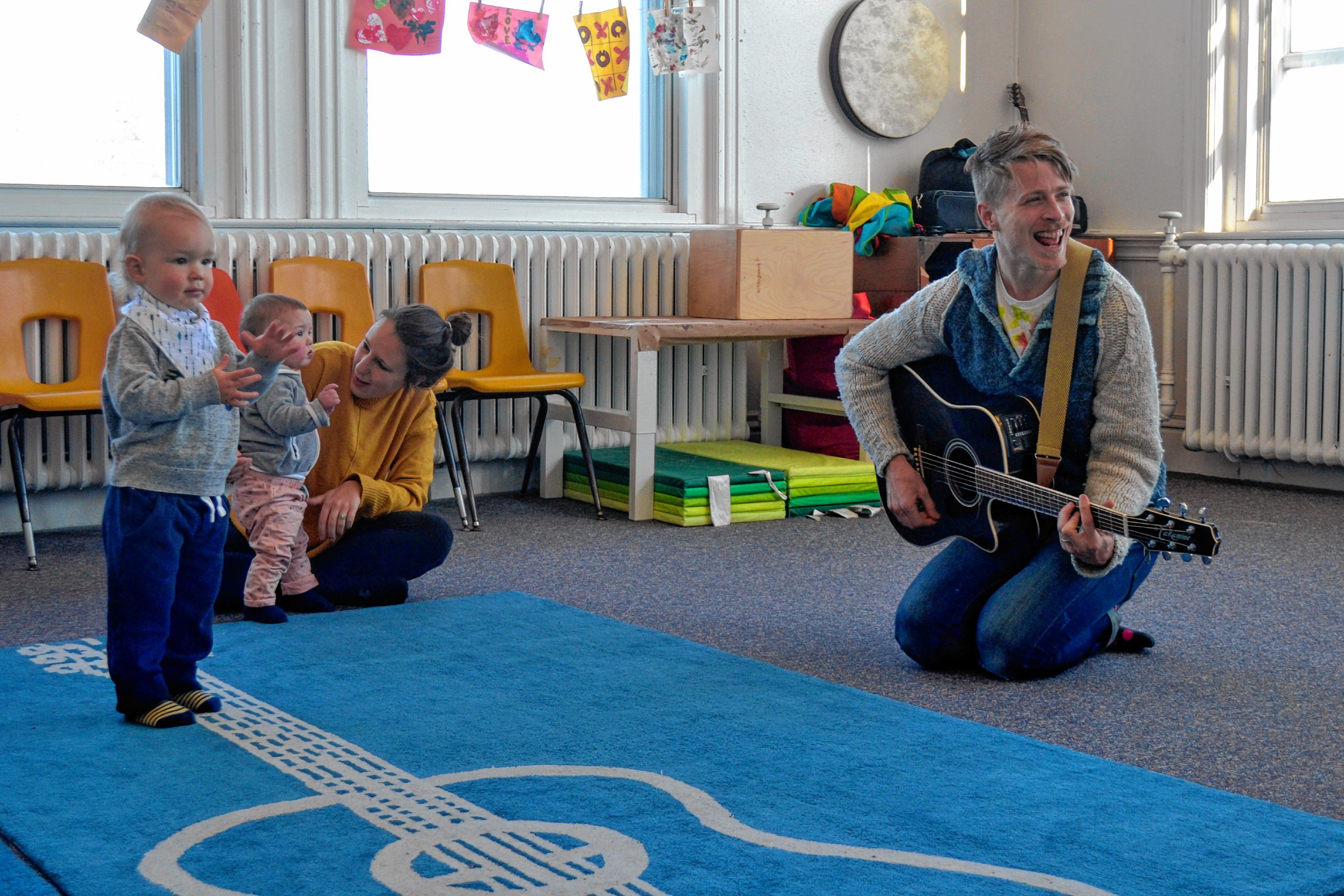 Mr. Aaron sings and dances with his little friends earlier in March.  Sarah Pearson