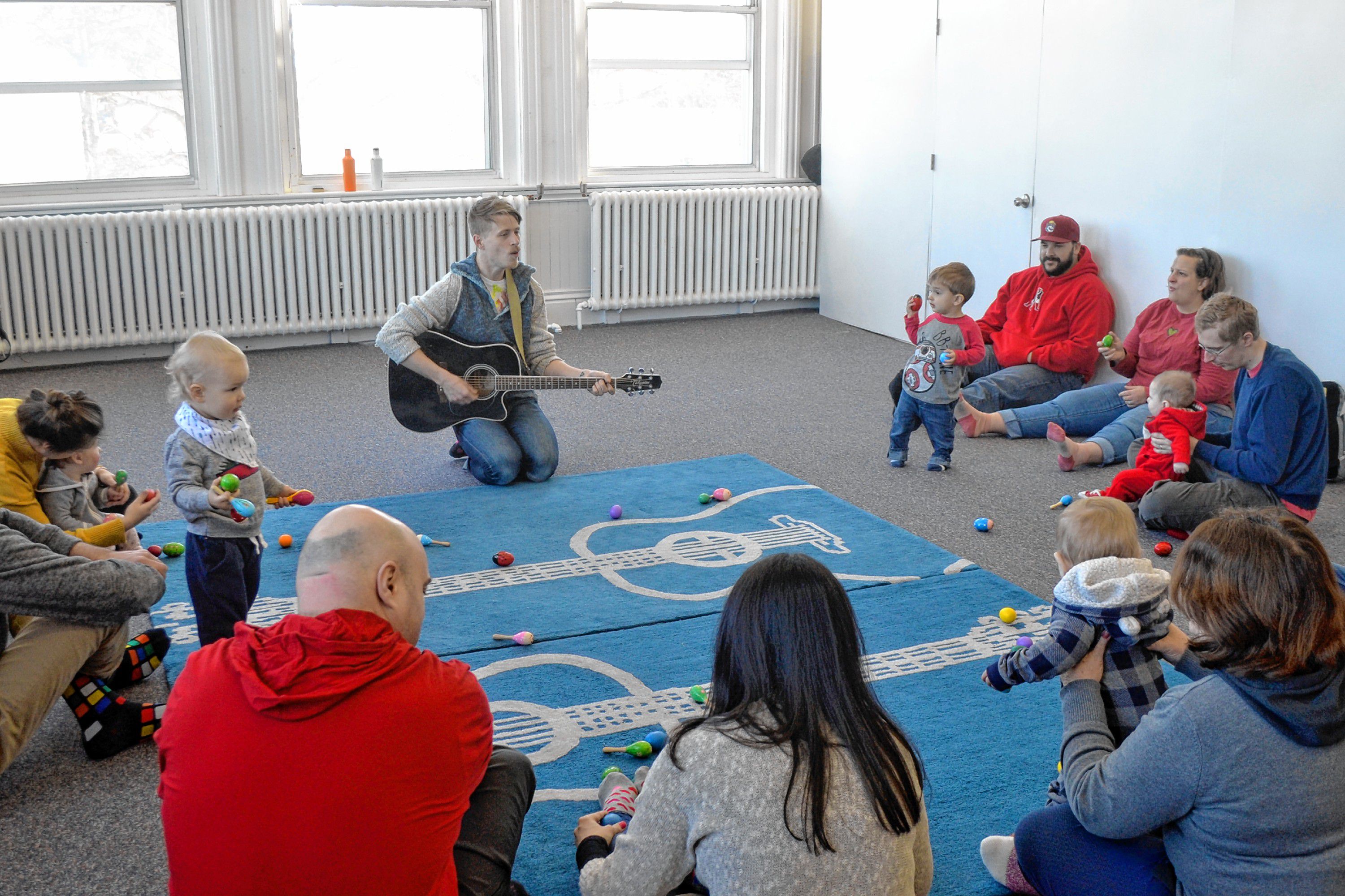 Mr. Aaron sings and dances with his little friends earlier in March.  Sarah Pearson