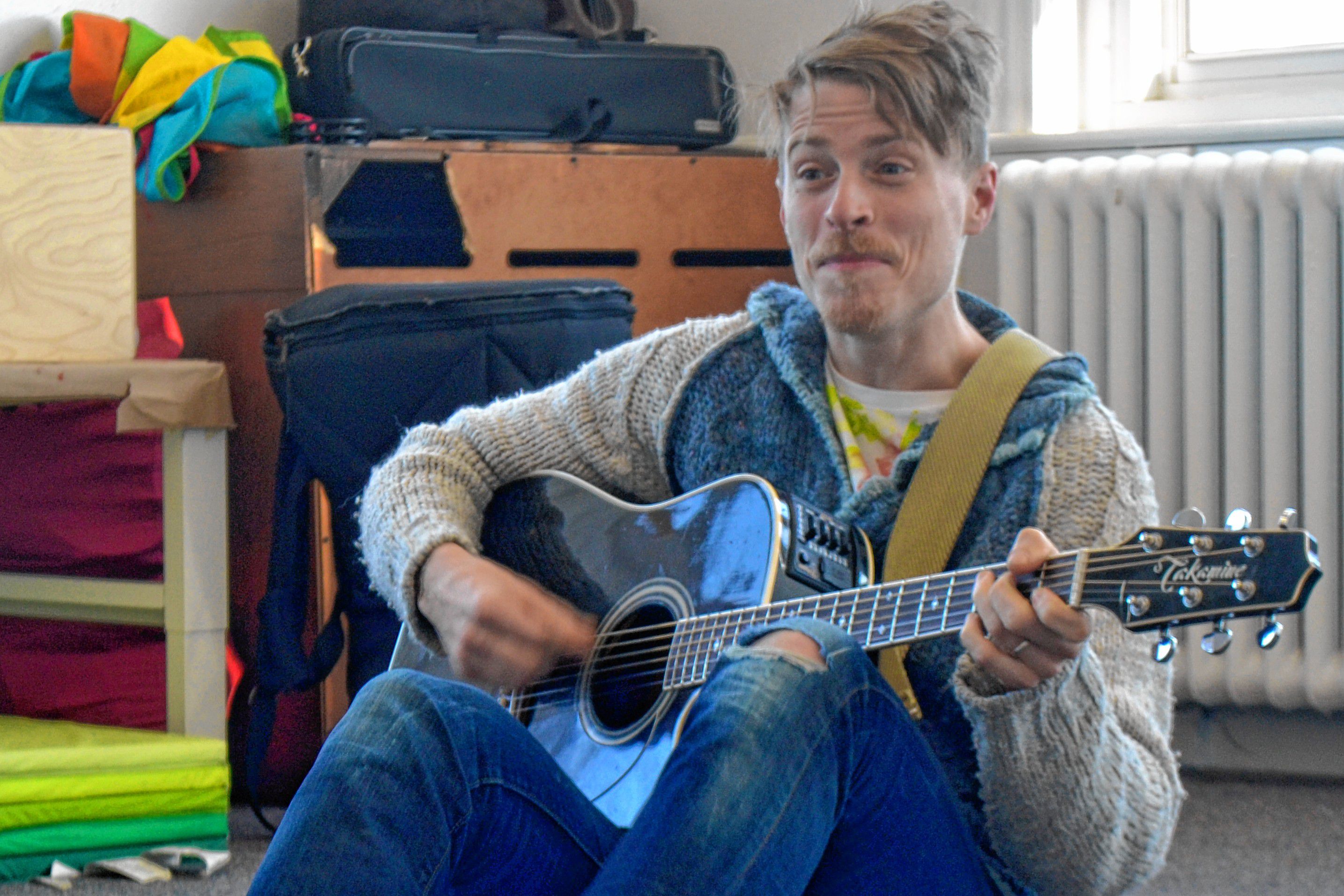 Mr. Aaron sings and dances with his little friends earlier in March.  Sarah Pearson