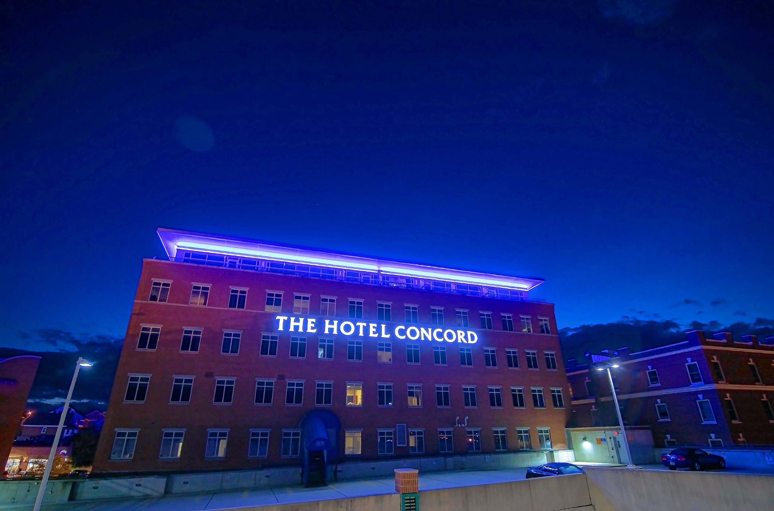 The Hotel Concord with its blue lights on after sunset on Thursday, September 12, 2019. 