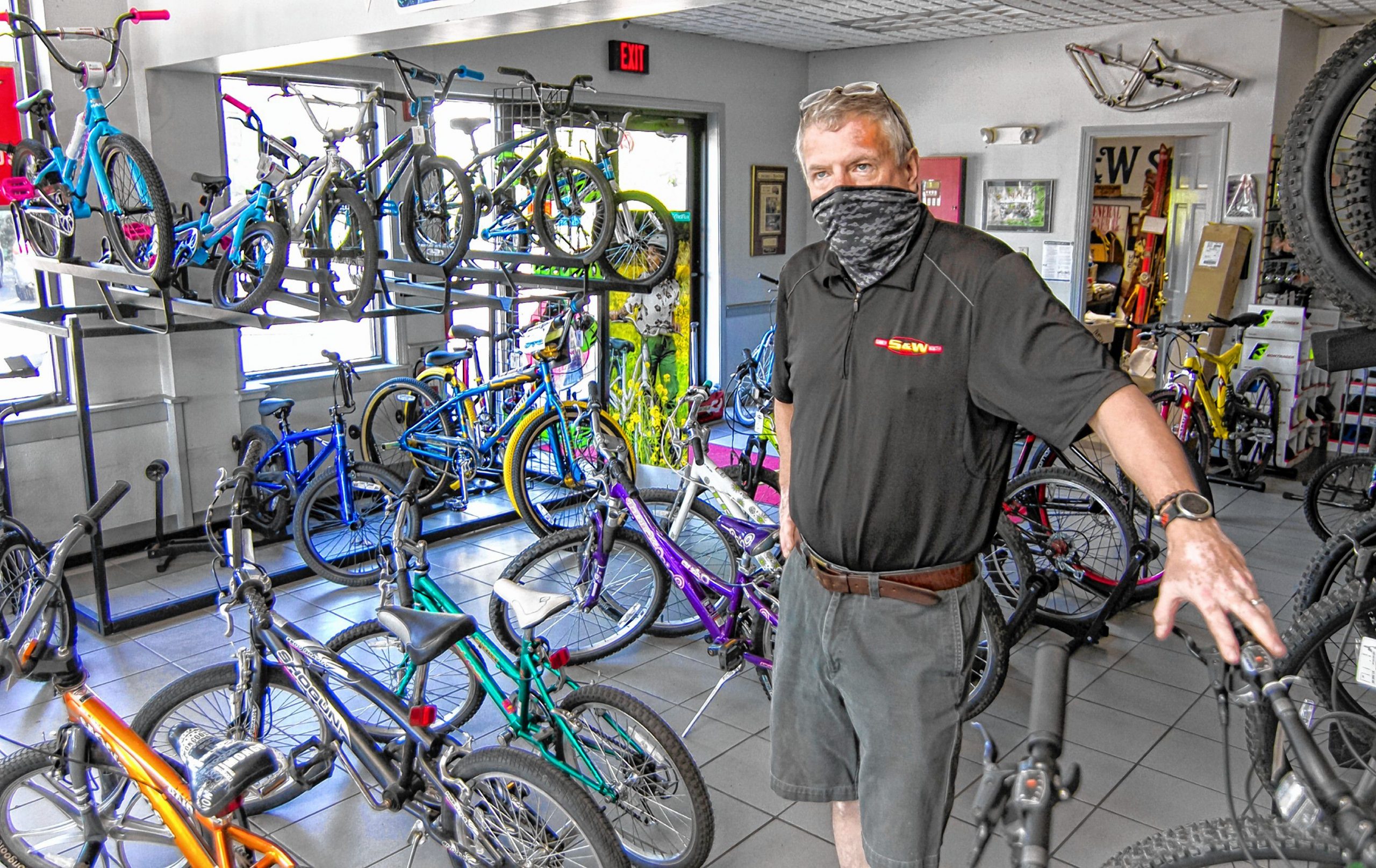 S&W Sports owner Tim Farmer had the best sales of bicycles in May ever. Farmer has refurbished bikes to keep up with demand. Elizabeth Frantz