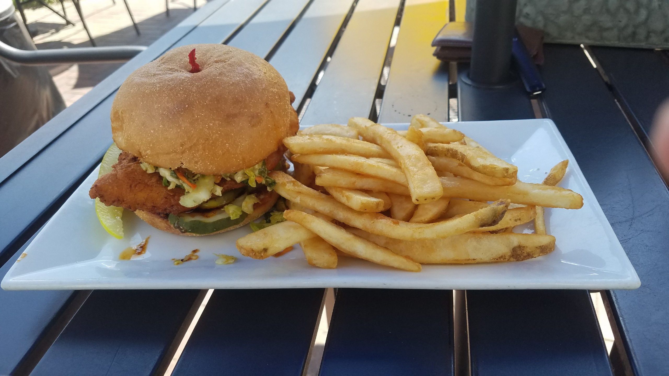 The Nashville Chicken sandwich from Cheers, with a side of fries.  THE FOOD SNOB / Insider staff