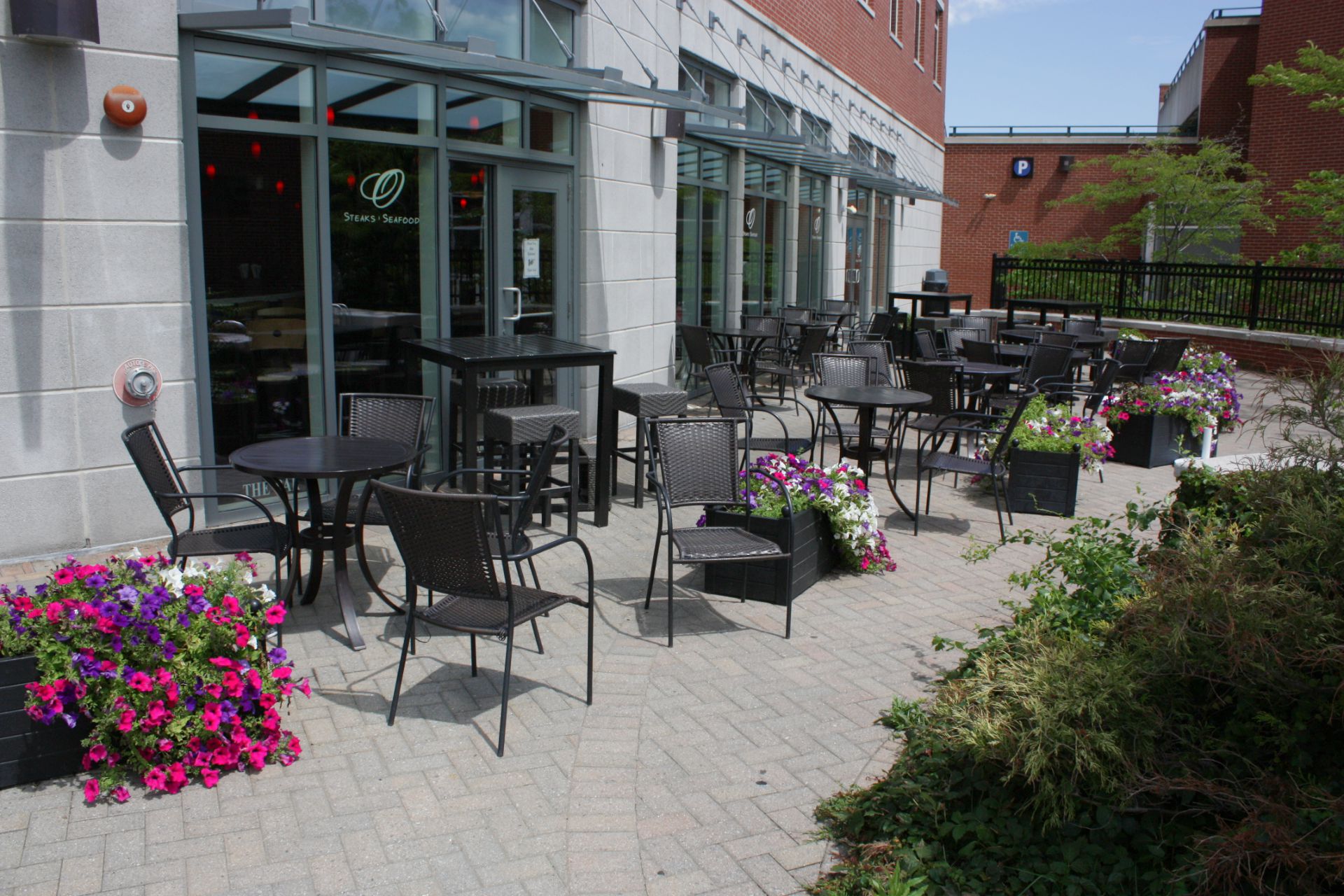 O Steaks & Seafood offers a classy patio tucked back from the sidewalk on South Main Street with seats for 42 people . JON BODELL / Insider staff