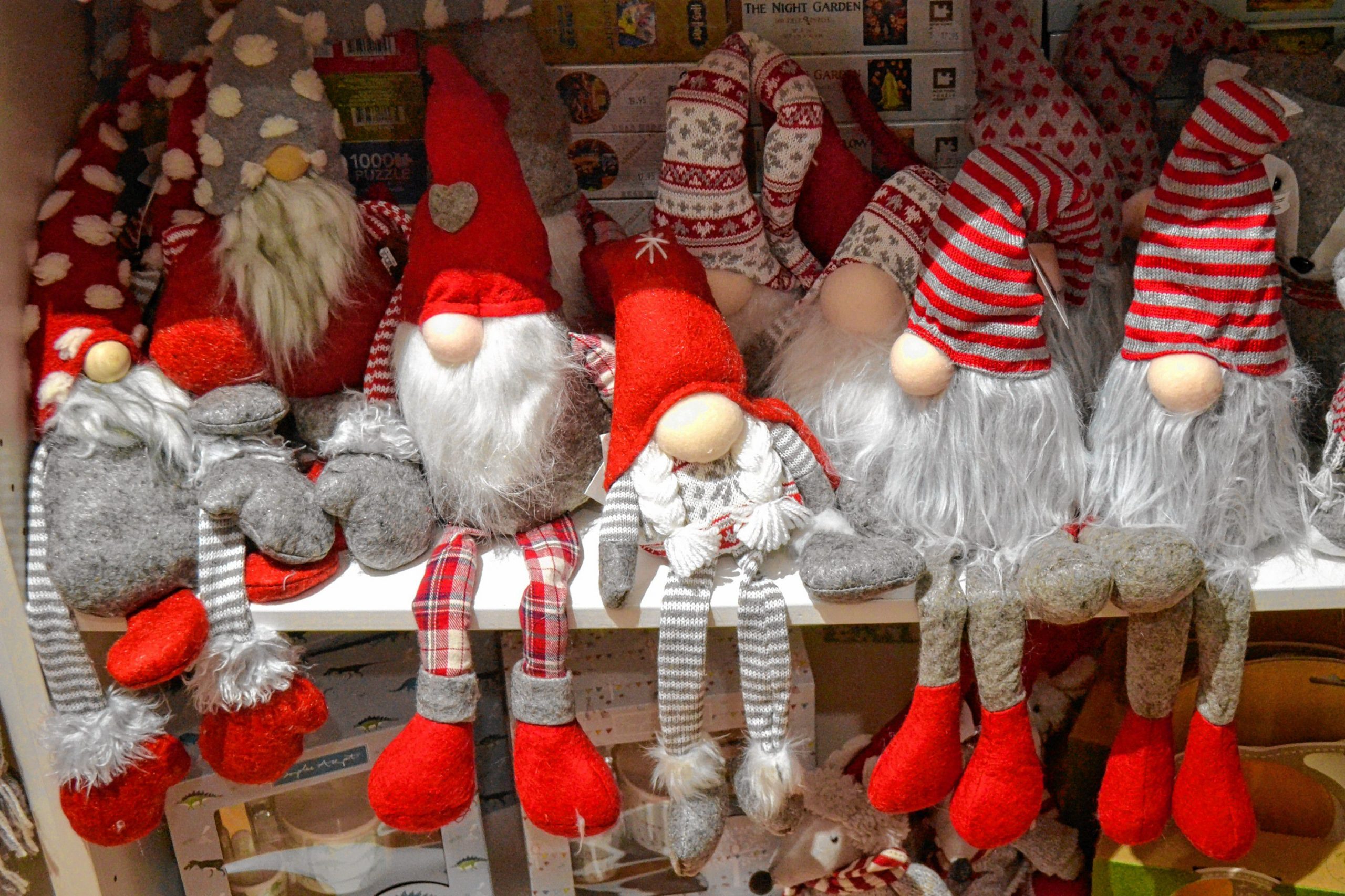 ABOVE: Gnomes are for sale at Viking House during the 2019 holiday season.LEFT: A boxed gift from Caring Gifts is ready to be delivered.