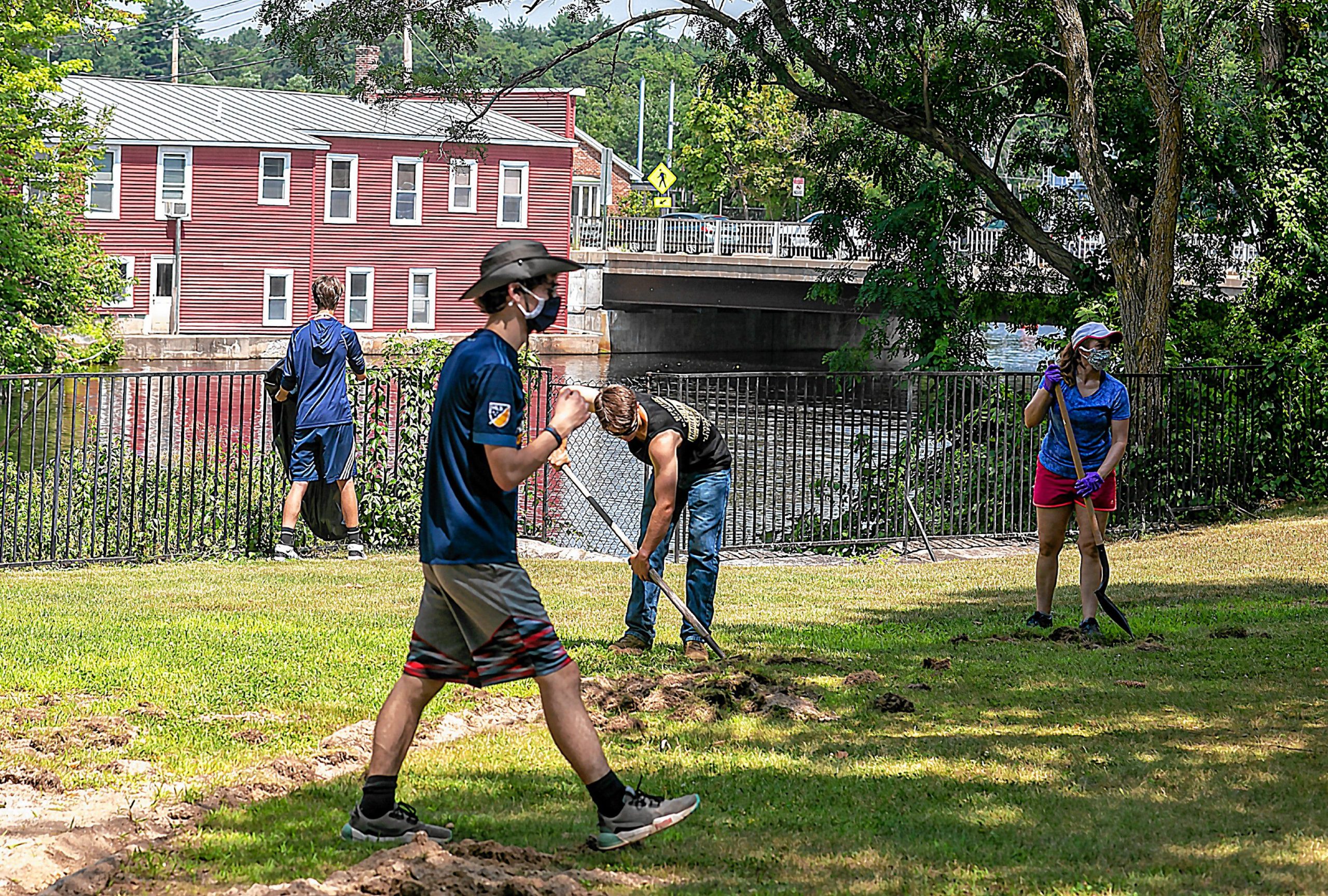 Connor Baldwin walks through Riverside Park in Penacook as he leads his group of friends on the clean up of the area on Tuesday, August 11, 2020. GEOFF FORESTER