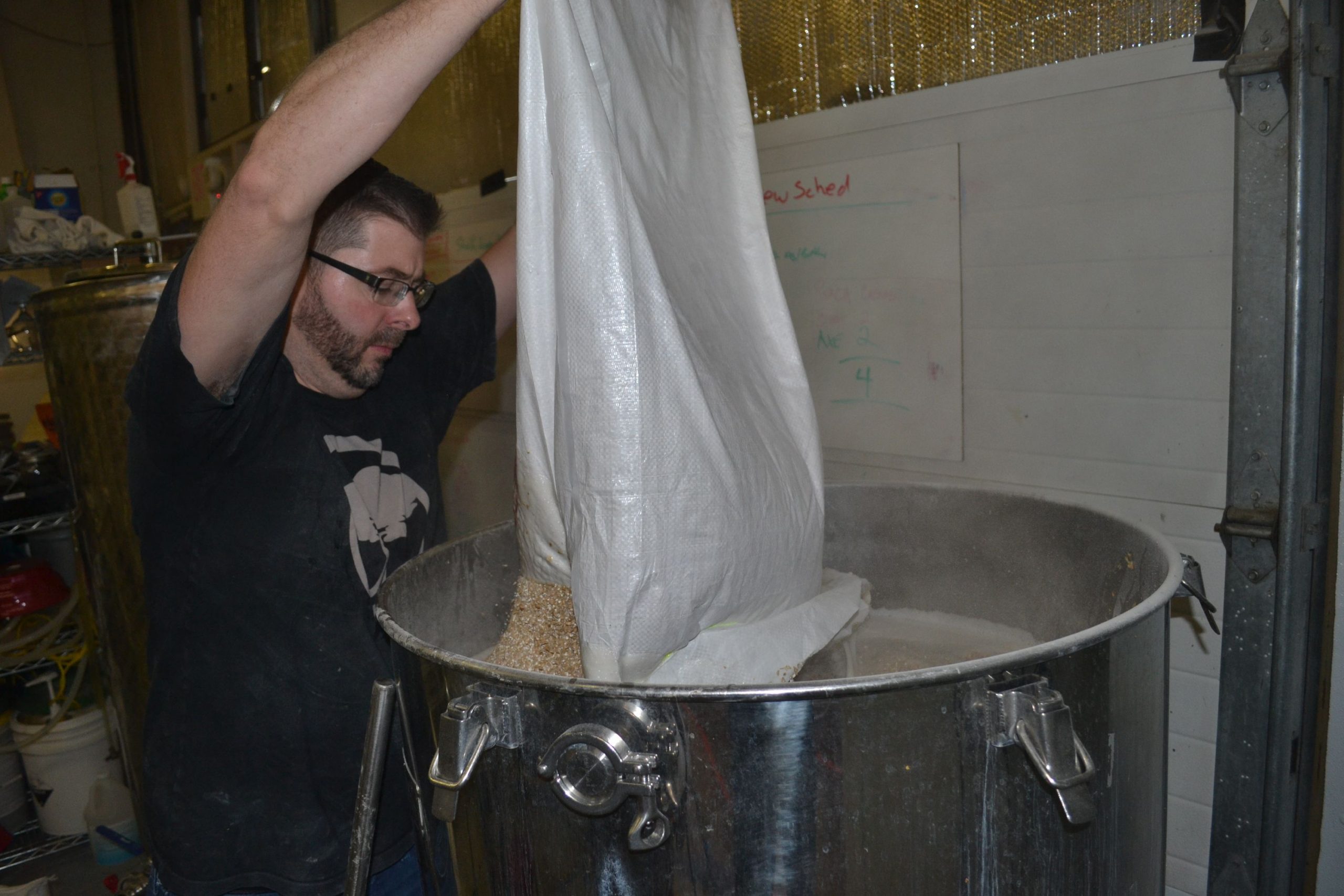 Lithermans co-owner and head brewer Steve Bradbury adds ingredients to a batch of Misguided Angel. TIM GOODWIN / Insider staff