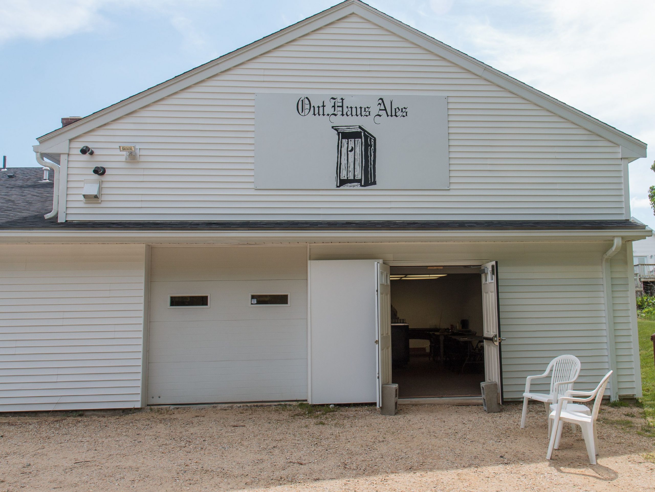 The main entrance to Out Haus Ales located at 442 1st Tpke, Ste 2 in Northwood, NH  