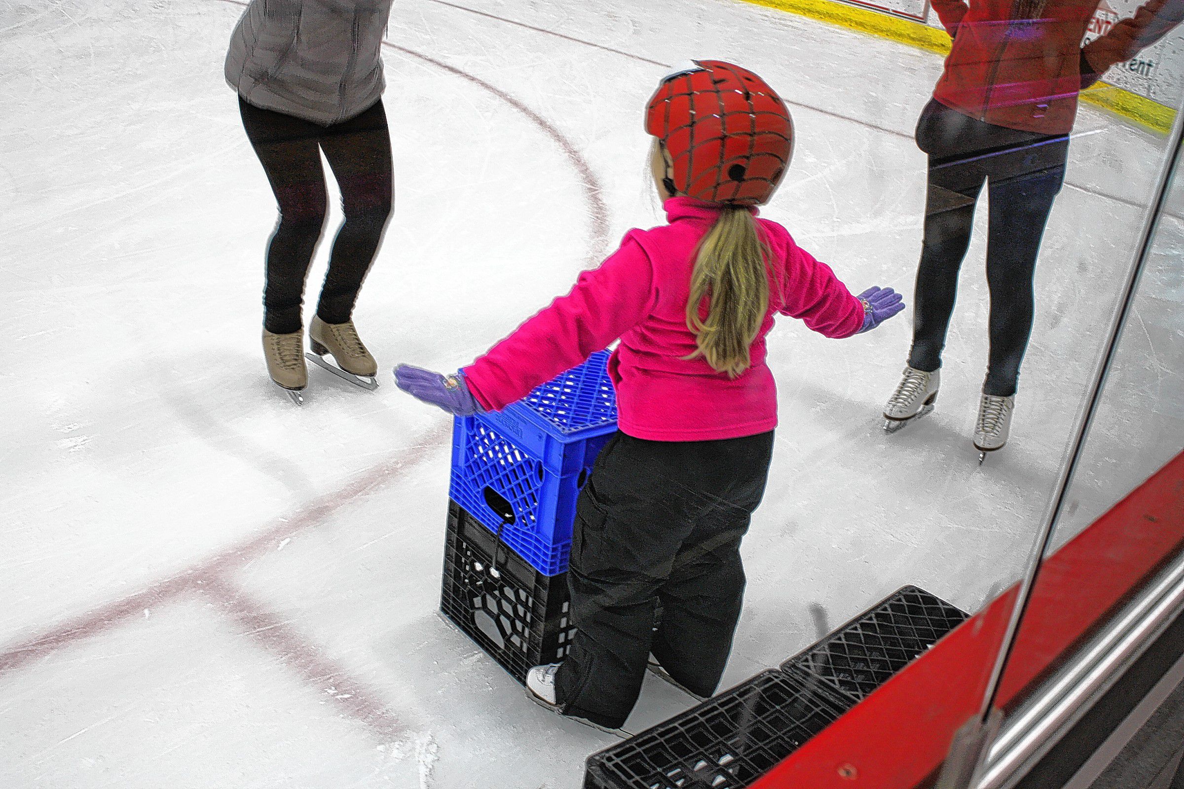 Concord Parks and Recreation offers the Itsy Bitsy Skaters Program for kids ages 3 to 5 on Wednesday afternoons at Everett Arena. This is a chance for little ones to get familiar with moving around on the ice, with guidance from some of Parks and Rec’s finest instructors. This past Wednesday was another slippery good time. Above: Skating instructors Kari Inglis (right) and Cathi McDonnell help Kayda, 4, keep her balance while Alaina, 4½, goes nice and slow behind them. There were a few falls during the lesson, but the girls were eager to get right back up and keep trying. Top right: Alaina gets some help lacing up her skates before taking the ice. This was Alaina’s third lesson, making it the third time she’d ever been on skates. Right, above: Alaina holds out her arms to keep her balance. Right, below: These girls got the hang of it pretty quickly. Bottom right: Corah (right), 1½, is a little young for the skates right now, but that didn’t stop her from coming out to watch her sister, Kayda, give it a shot.           