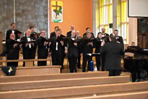 The New Hampshire Gay Men's Chorus rehearses at Wesley United Methodist Church in 2015. 