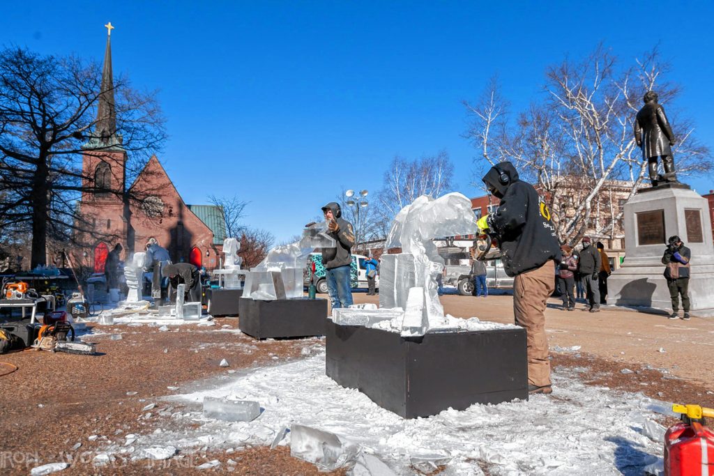 Ice sculptors work on their carvings during previous Winter Fest celebrations. 