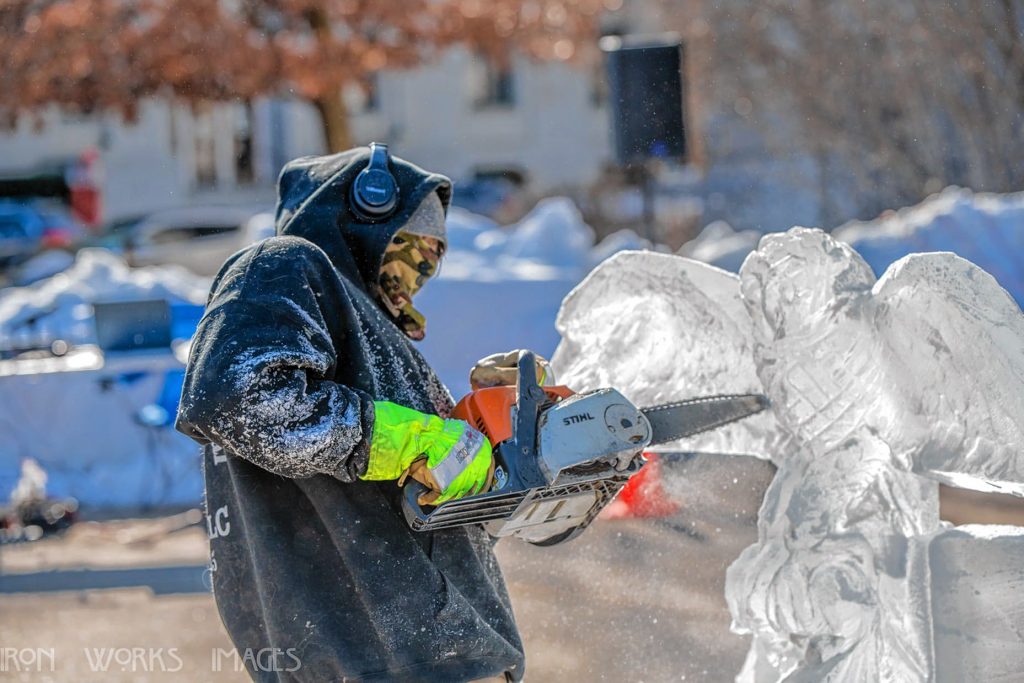 Ice sculptors work on their carvings during previous Winter Fest celebrations. 