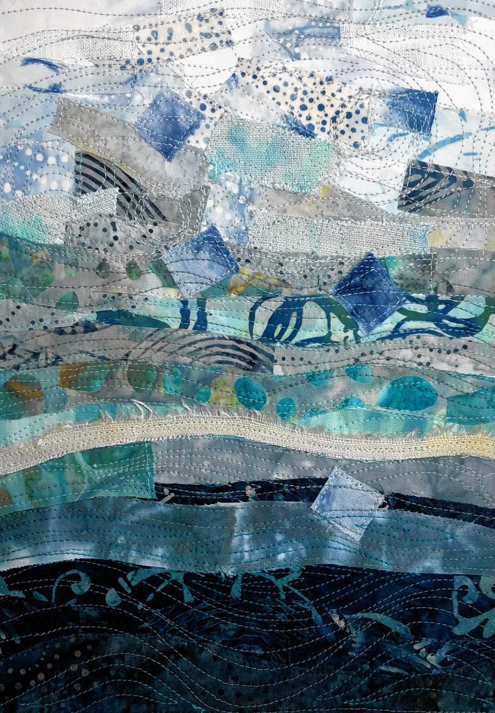 “Seafoam,” a fabric collage by Cheryl Miller. 