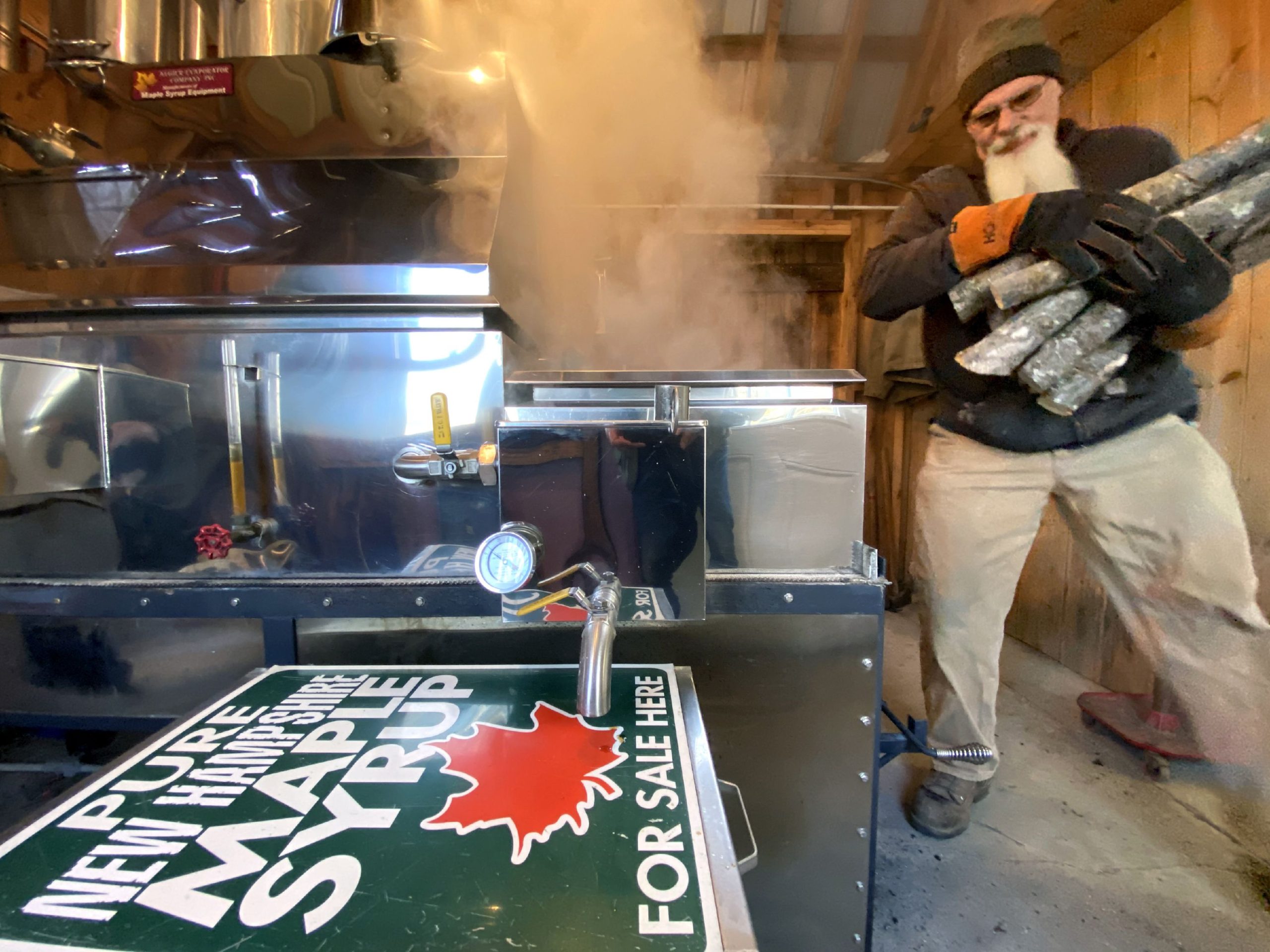 Richard Anthony brings in a load of wood to put into his father-in-lawâs evaporator at Red Roof Maples in Loudon on Saturday, March 13, 2021. Anthony loaded wood every four minutes to keep the fire going at the maximum heat. GEOFF FORESTER