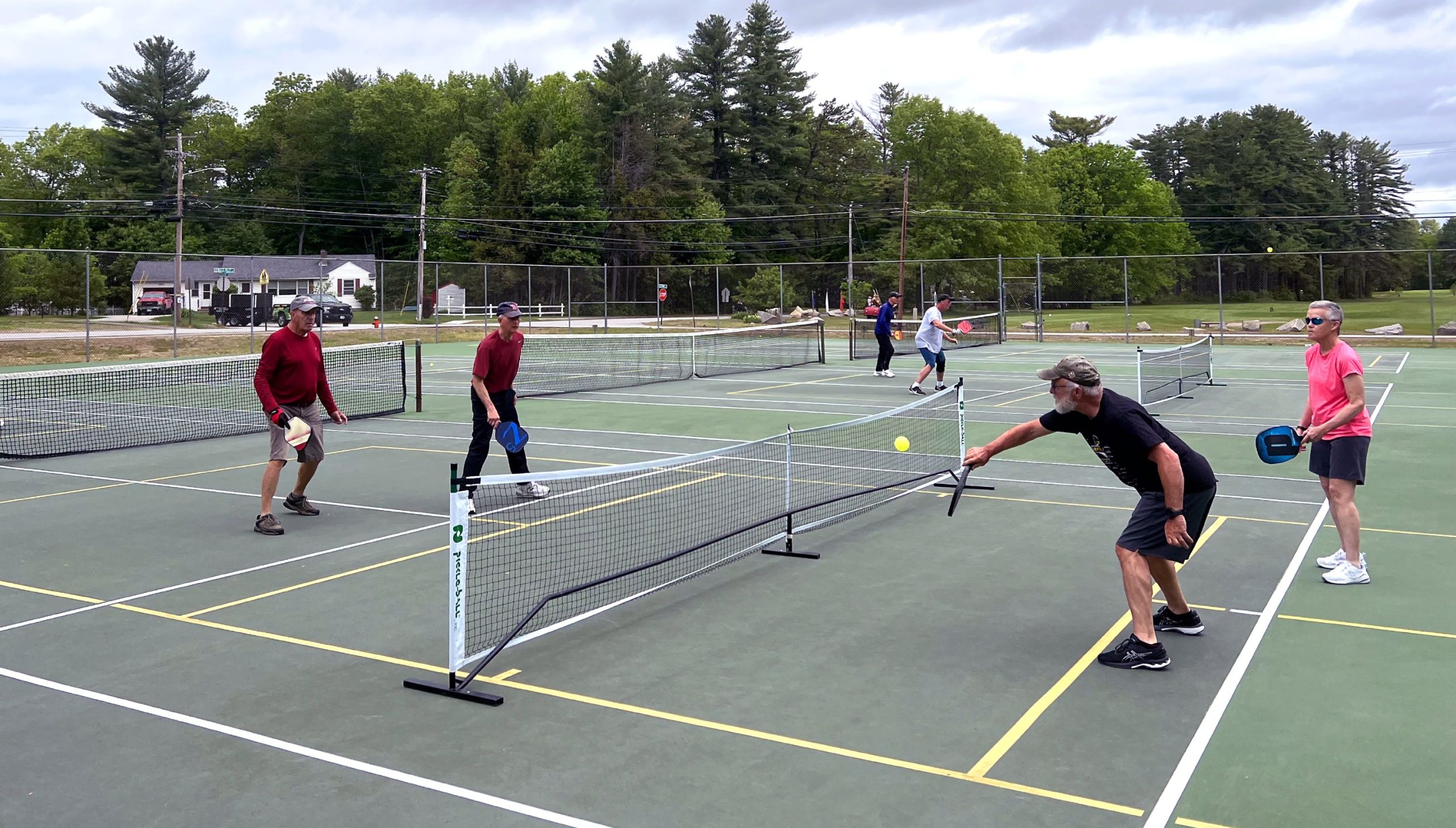 Dave Stevenson hits the ball in a pickleball match at Beaver Meadow on Friday, May 27, 2022. Stevenson was instrumental in bringing the game to Concord.  