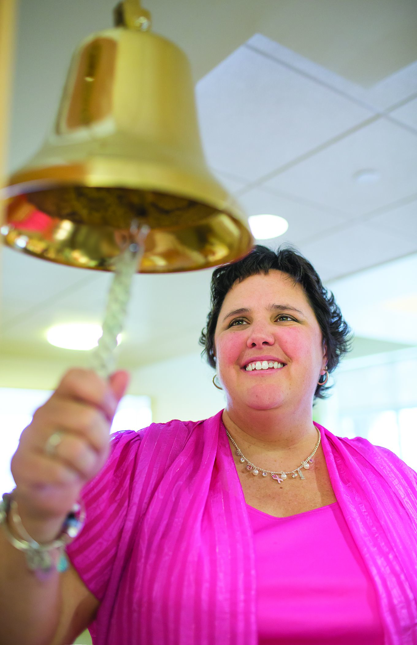 Lisa Ober rings the bell at the Payson Center for Cancer Care. Every time a cancer survivor finishes treatment at the Payson Center, they ring a bell.  At the start of Rock 'N Race, the bell will be rung in honor of all friends and family who have experienced cancer.  Courtesy