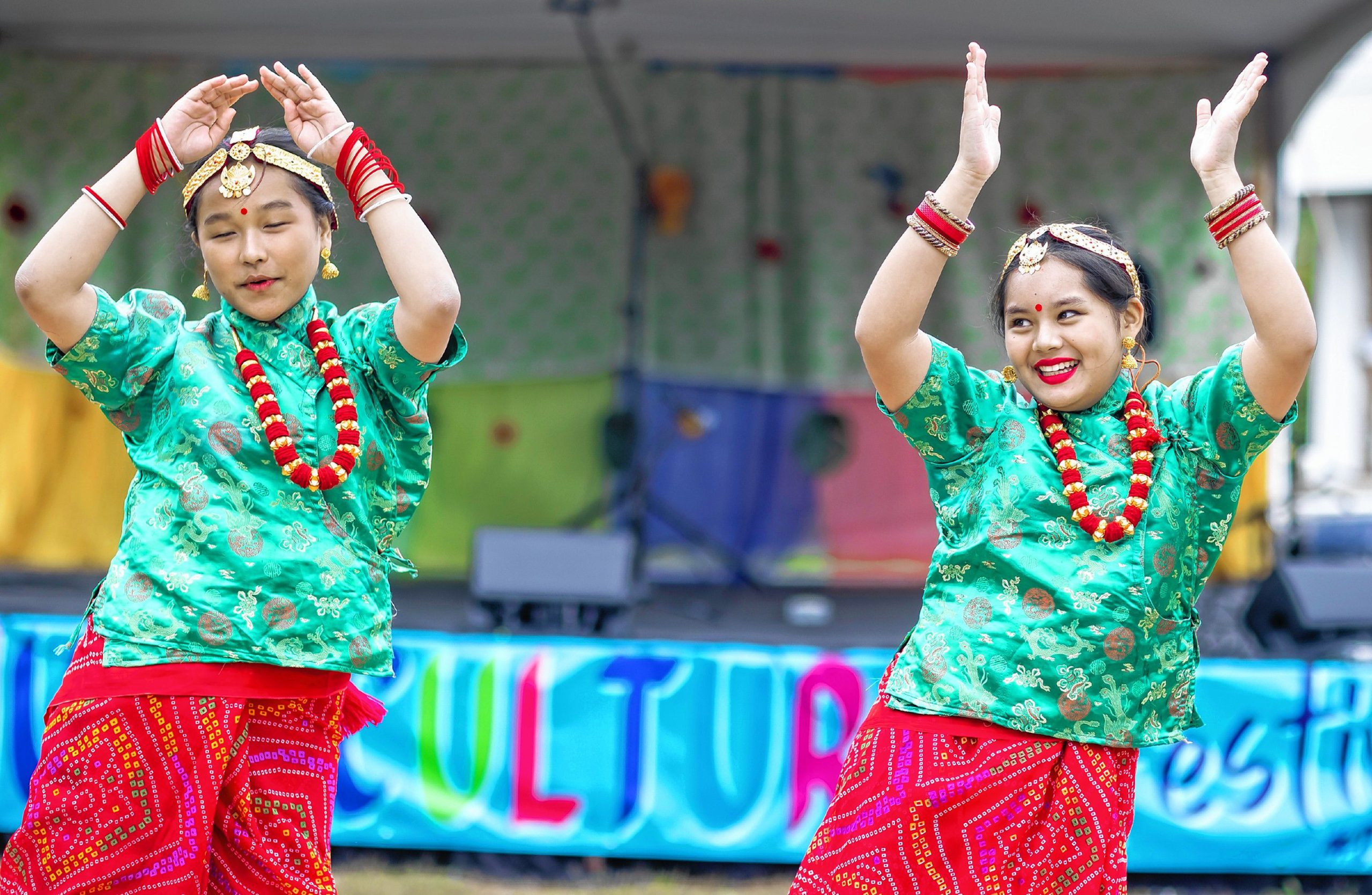 Juniper Gurung (left) and Bidisha Gurung dance at the 2023 Multicultural Festival at Keach Park on Sunday, September 23, 2023. GEOFF FORESTER